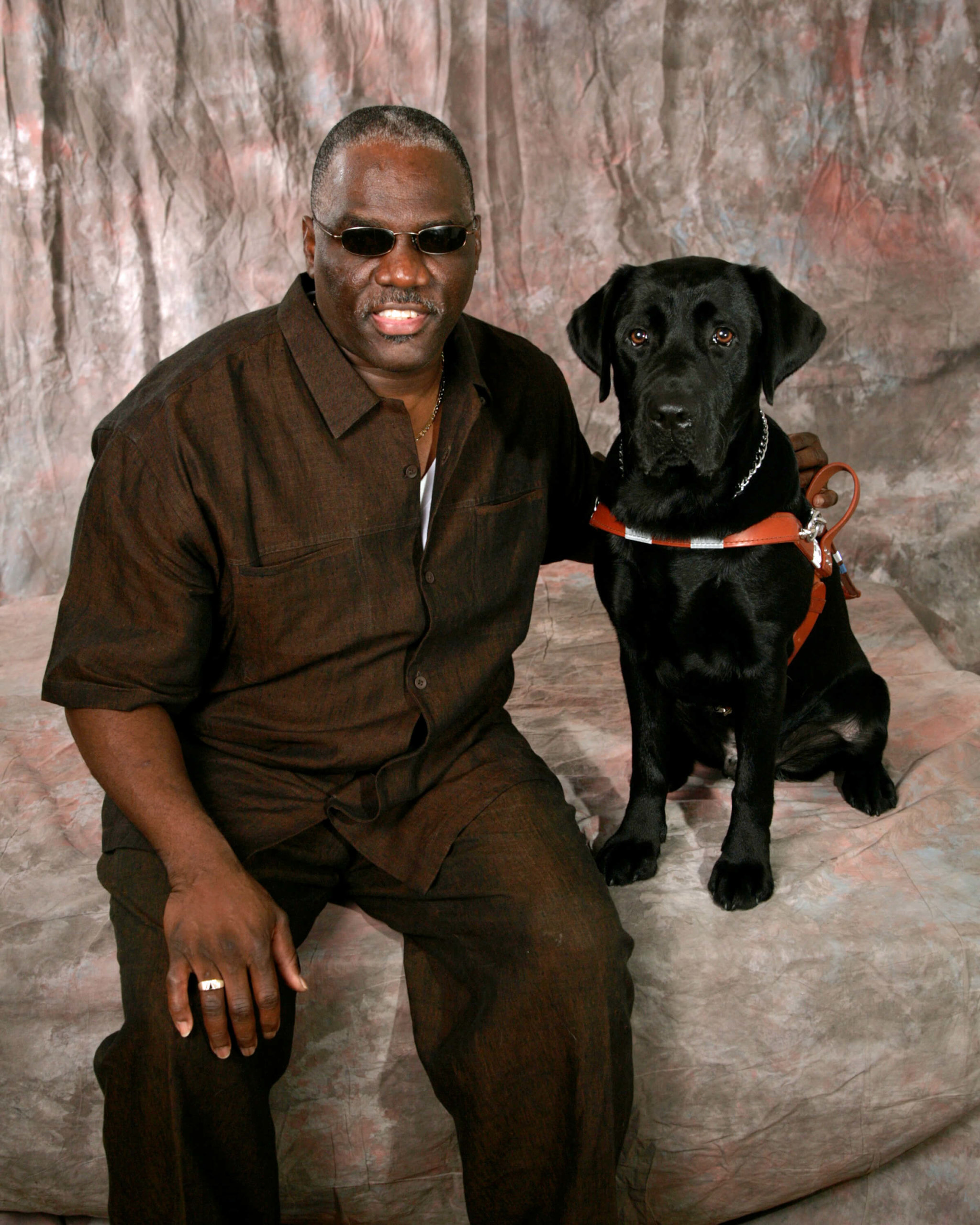 Cecil Williams and Guiding Eyes dog Orlando