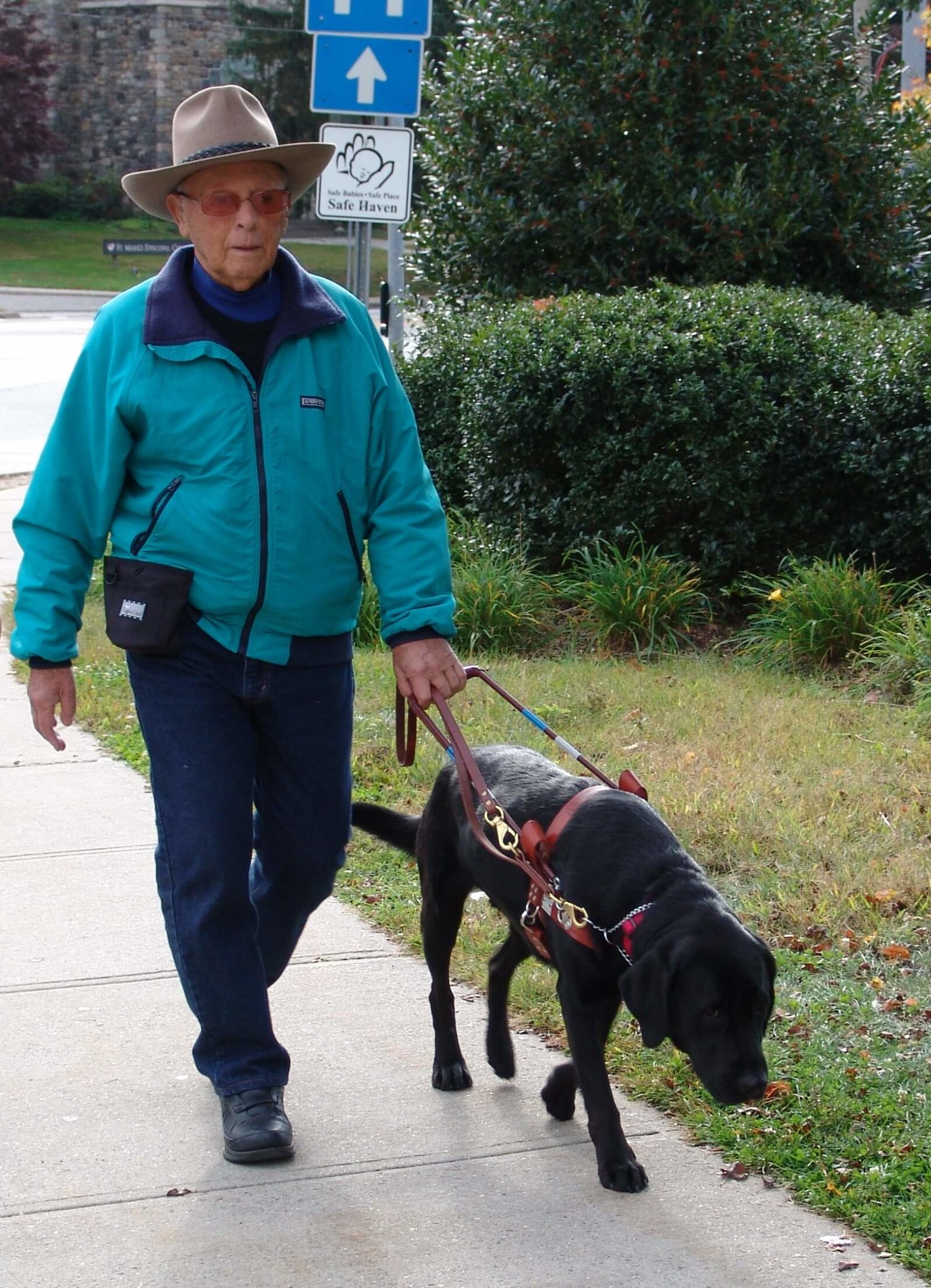 Paul Ellner and Guiding Eyes dog Ray
