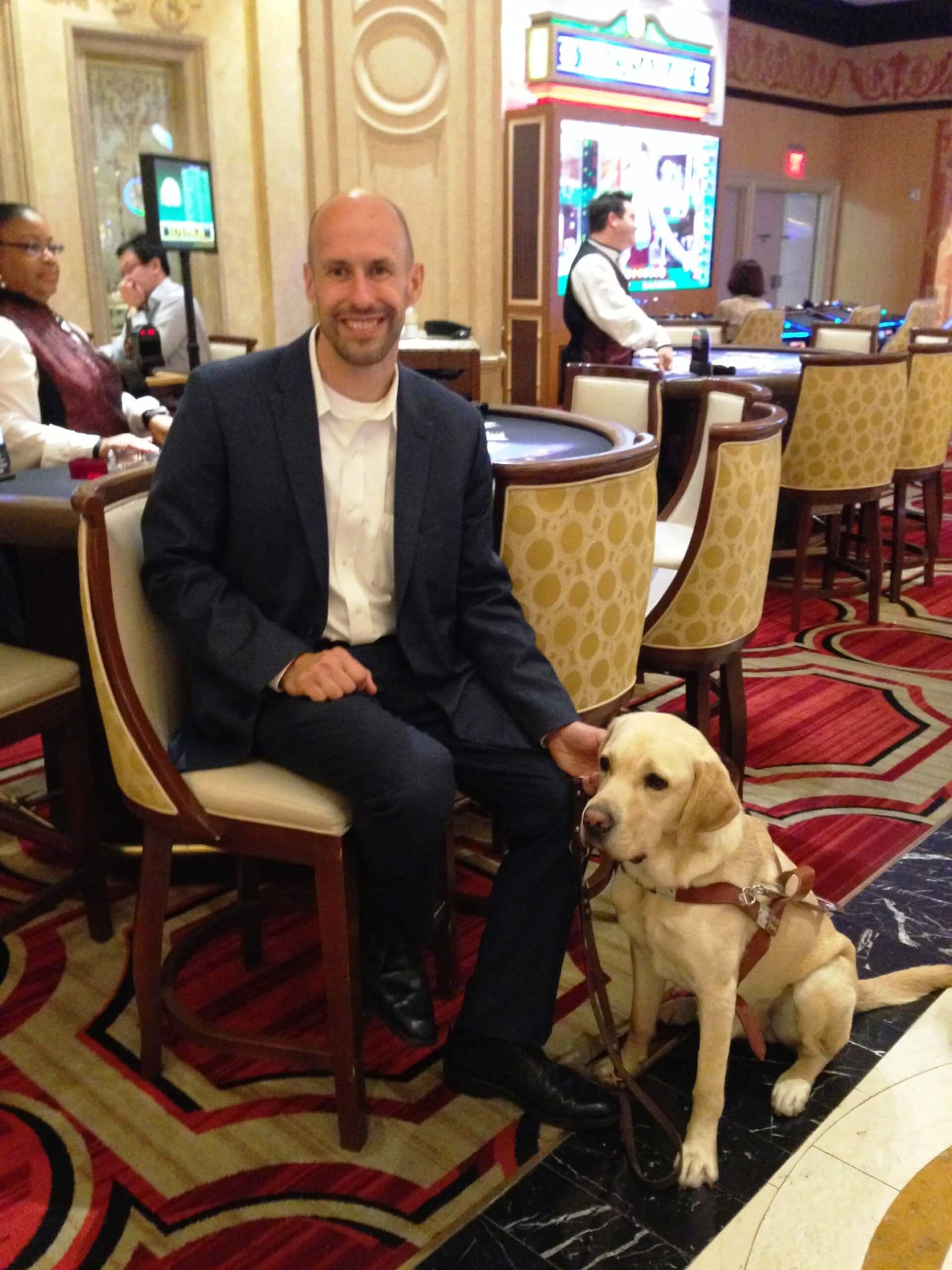 Guiding Eyes CEO Tom Panek with guide dog Gus at 2014 ACB Las Vegas