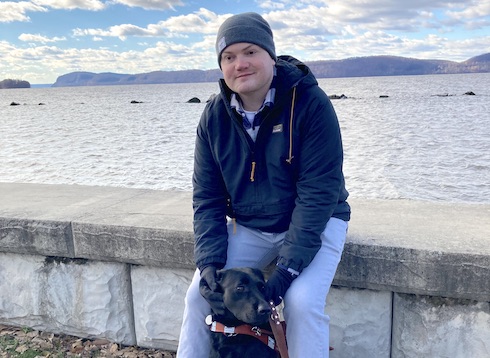 Graduate Andrew and guide dog Velvet