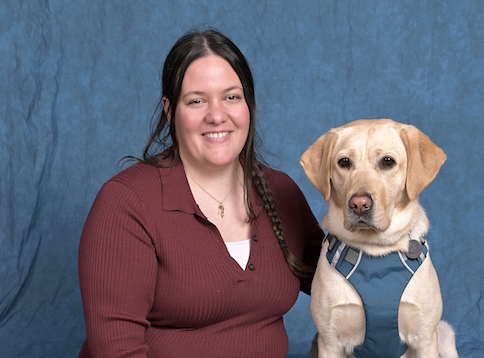 Graduate Angela and yellow Lab guide dog Cam