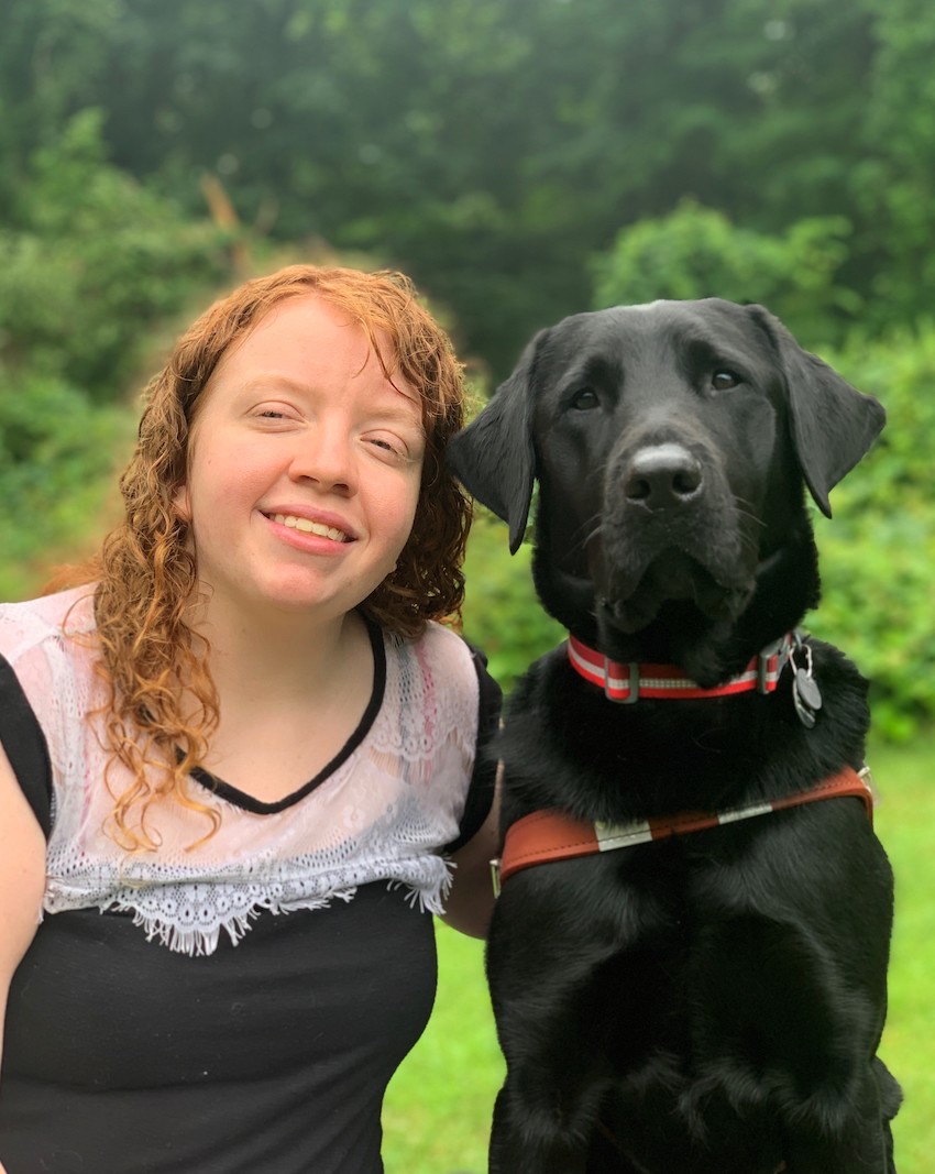 Graduate Ariana and guide dog Percy