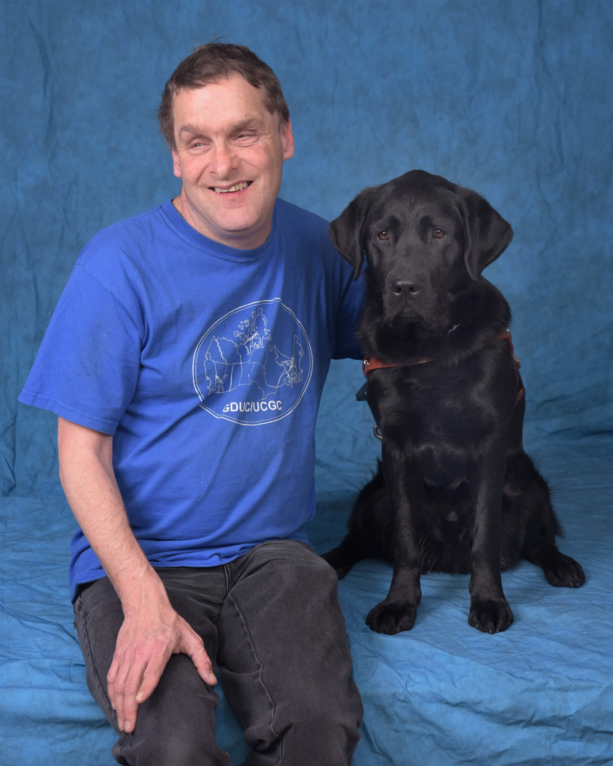 Graduate Brian and guide dog Farley