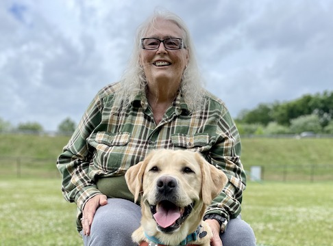 Graduate Bobbie and yellow Lab guide dog Zane