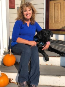 Brenda and Star enjoy the warmth of October sun on the porch