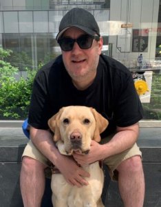 Grad Brian and Guide Dog Wes