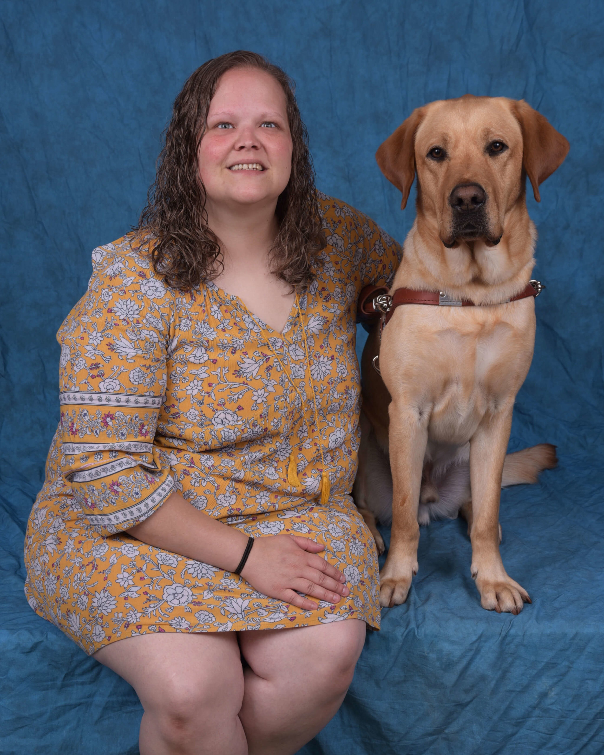 Graduation photo of July graduate Christine and guide dog Vereen