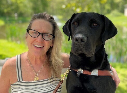 Graduate Colleen and guide dog Cash