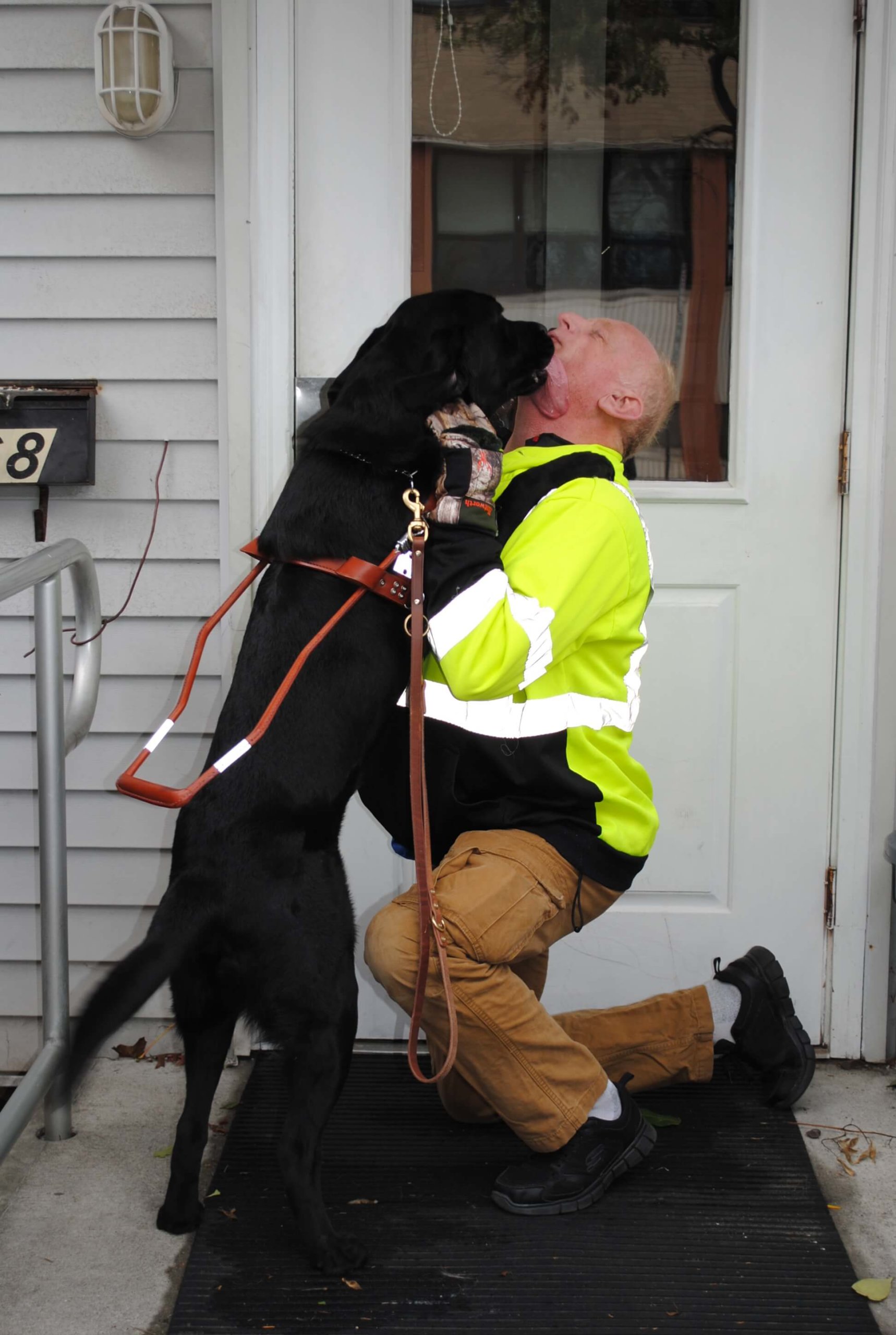 Argo gives Tommy a big kiss before heading out together