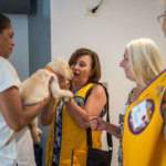 Annual Lions Day event guests meet Guiding Eyes puppies