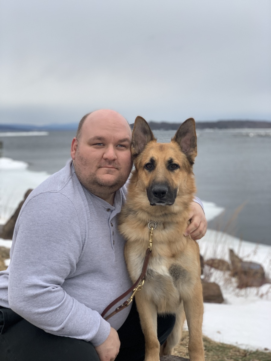 Graduate Dustin and GSD guide Pilot