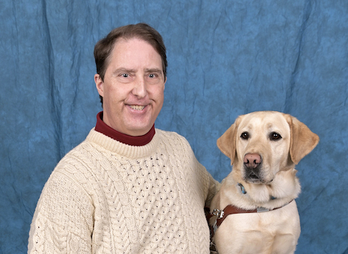 Graduate Gregory and yellow Lab guide Kenner