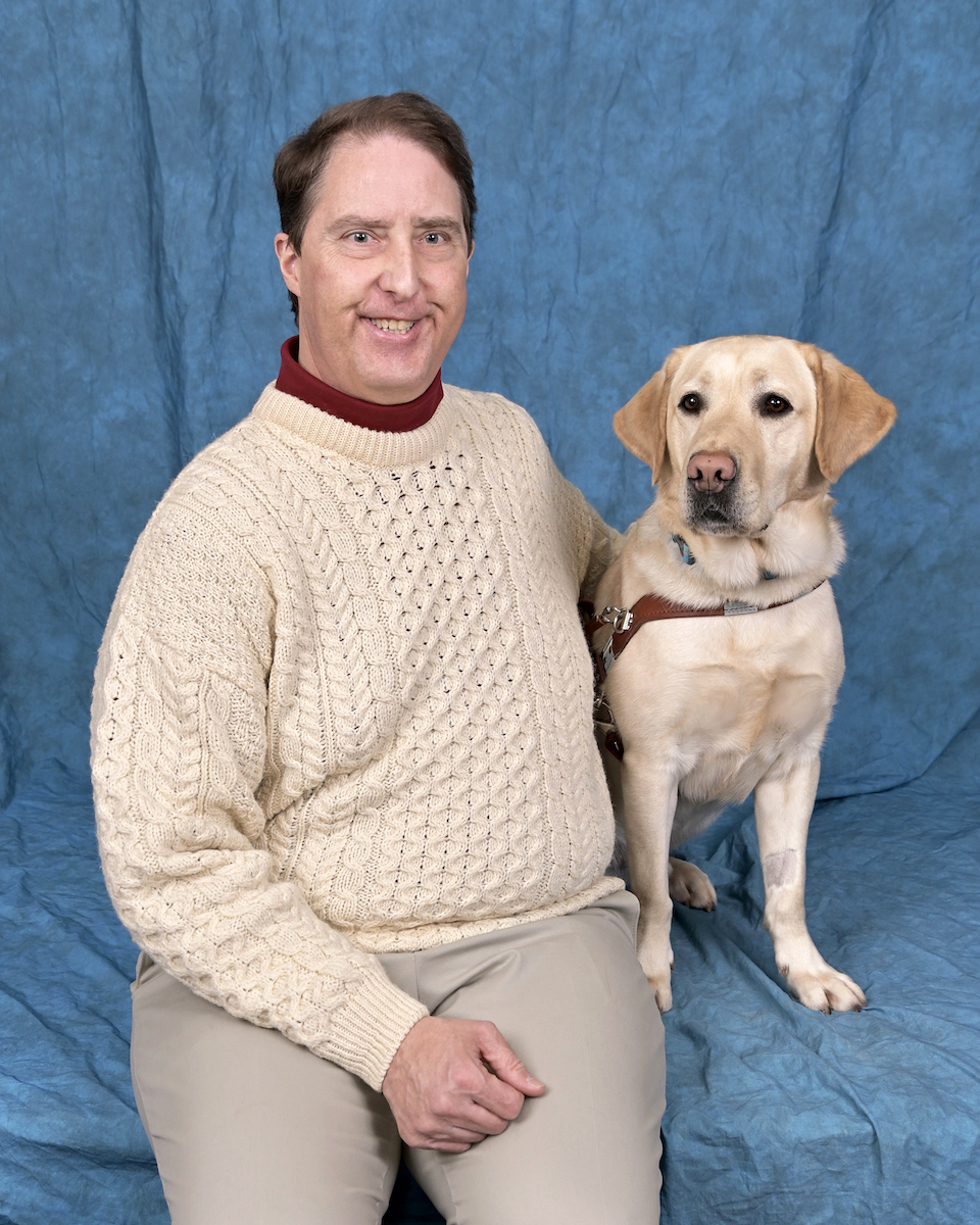 Graduate Gregory and yellow Lab guide Kenner