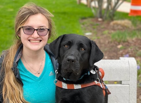 Graduate Hailey and guide dog Cleo