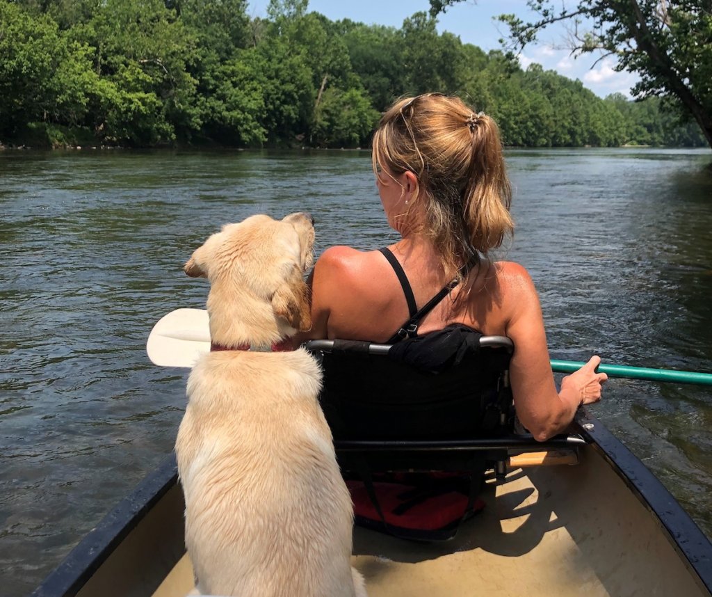 Yasha with raiser Heather in canoe