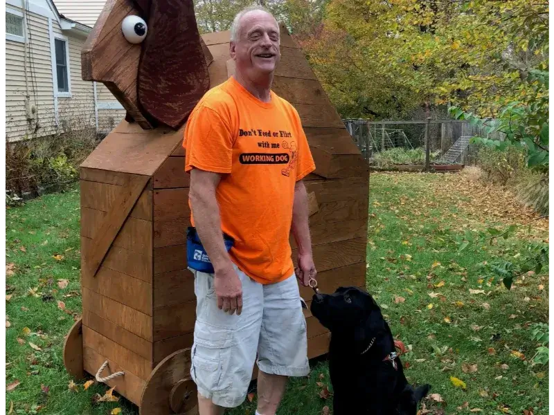 Tommy Gibson and his guide dog Argo