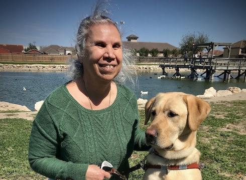 Graduate Irma and yellow Lab guide dog Caeser