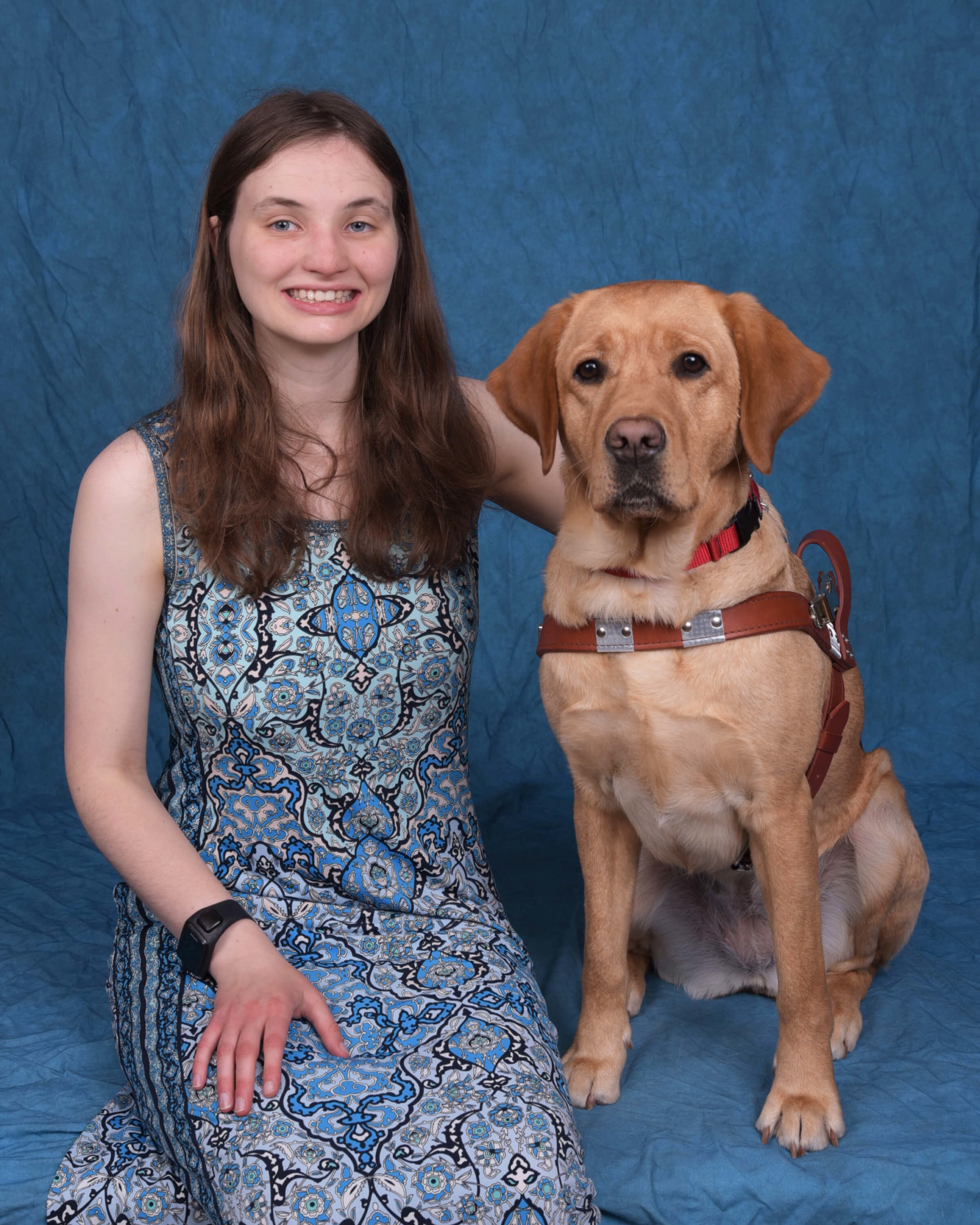 Grad Kate and guide dog Francine