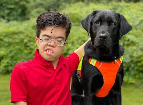Graduate Keanu and guide dog Tilly