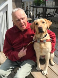 Graduate Ken and guide dog Pebbles