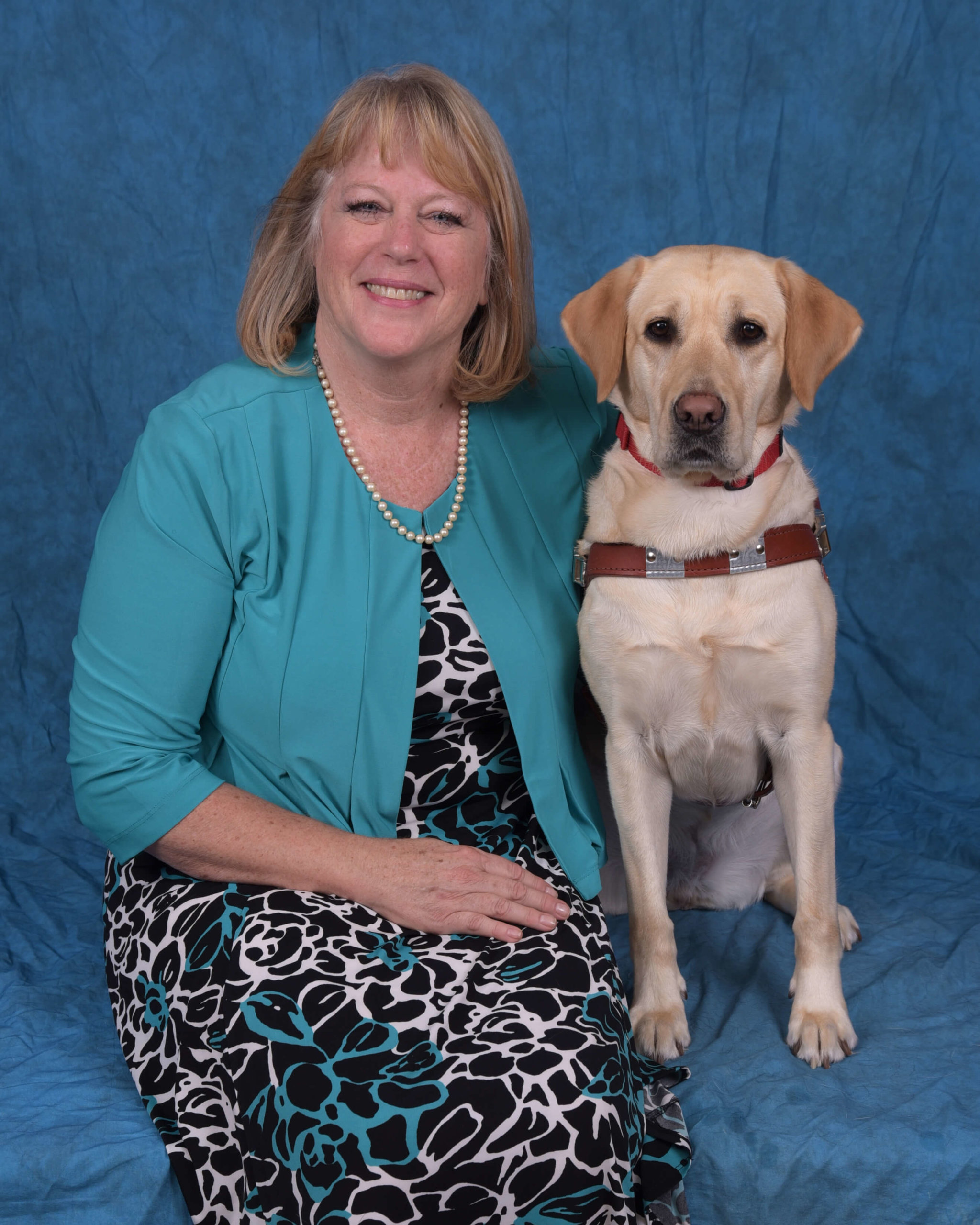 Graduation photo of July graduate Leslie and guide dog Yonnie