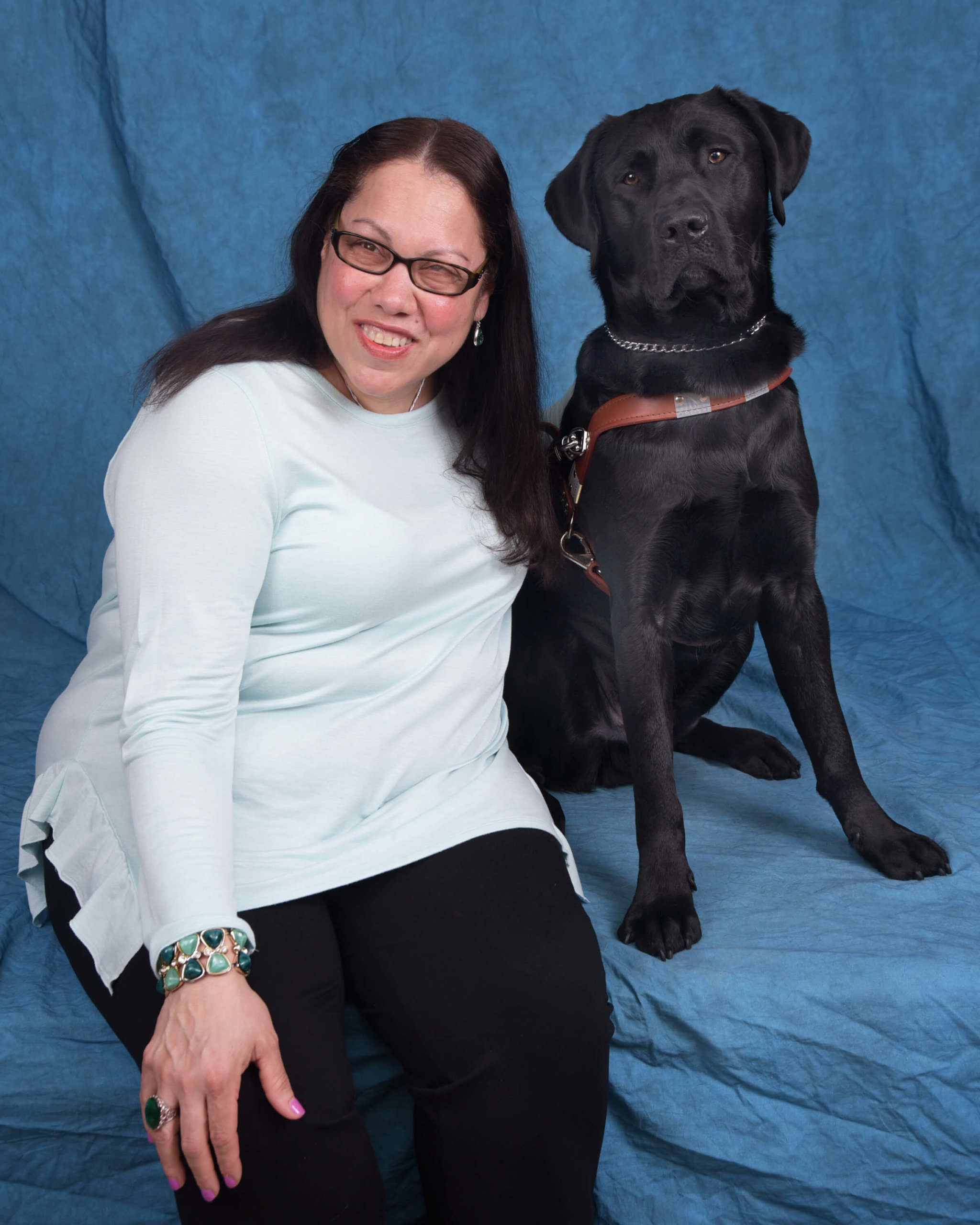 Graduate Lydia and guide dog Geoffrey