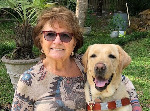 Graduate Lois and guide dog Elise