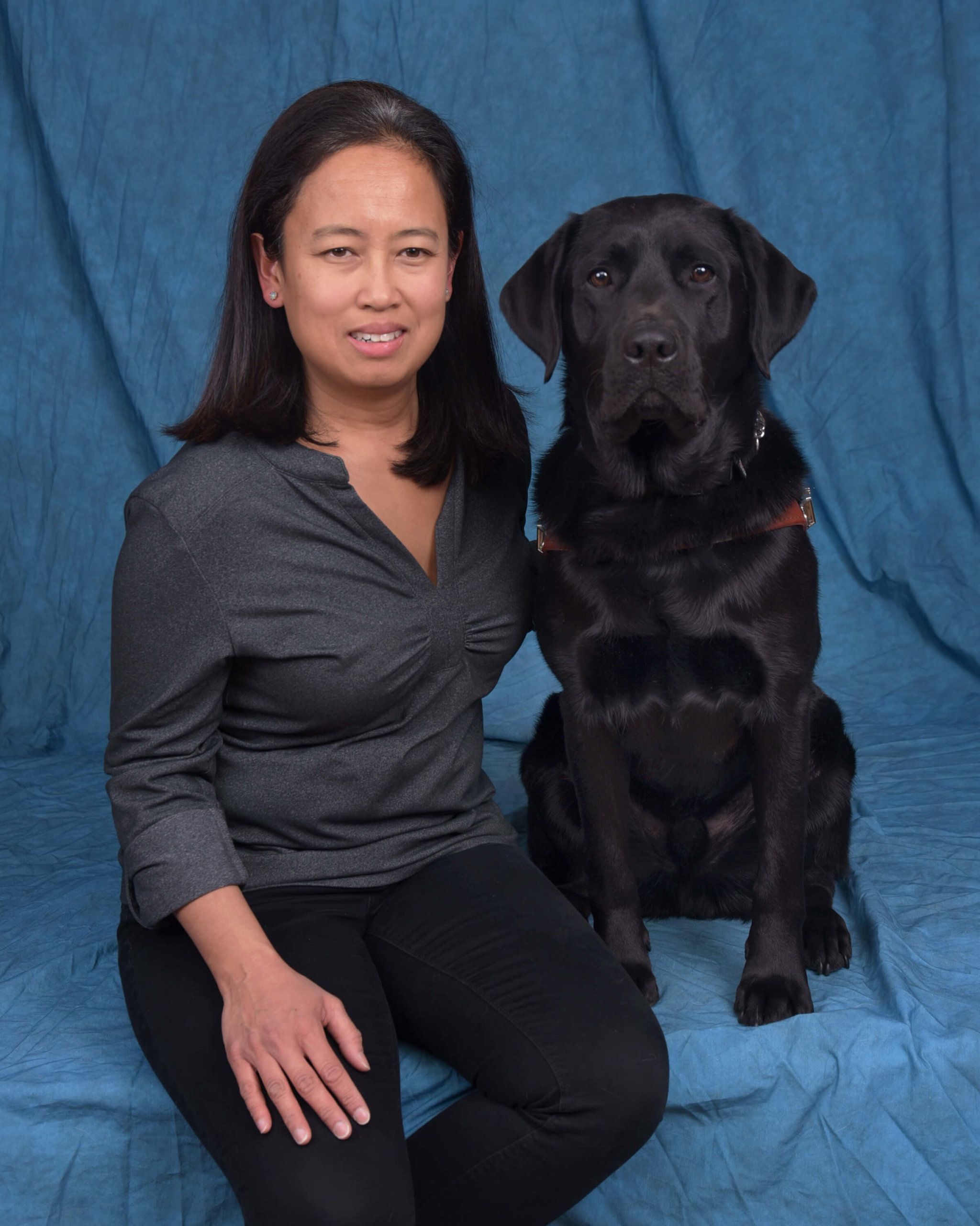 Graduate Maricar and guide dog Cliff