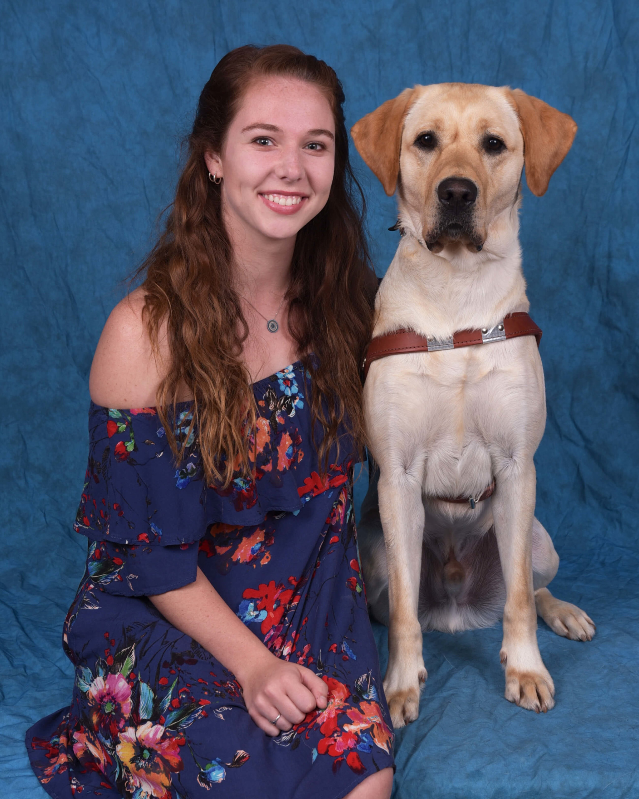 Graduation photo of July graduate Madeline and guide dog Mercury