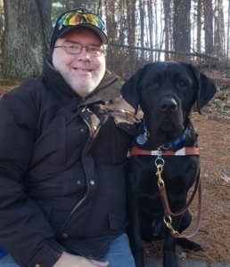 Grad Mark and guide dog Elvis
