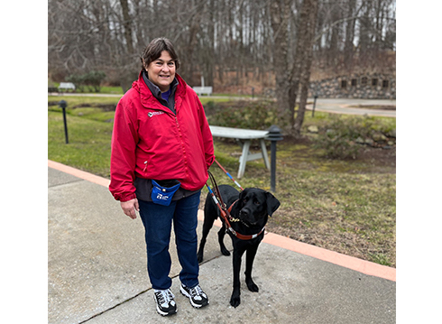 Graduate Mary and guide dog Odie