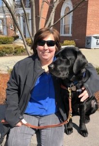 Graduate Mellissa and guide dog Dooley