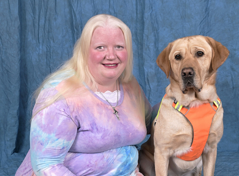 Graduate Molly and yellow guide dog Clinton