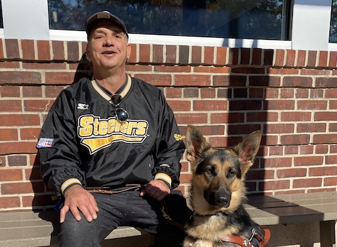 Graduate Paul and German Shepherd guide dog Kazzy