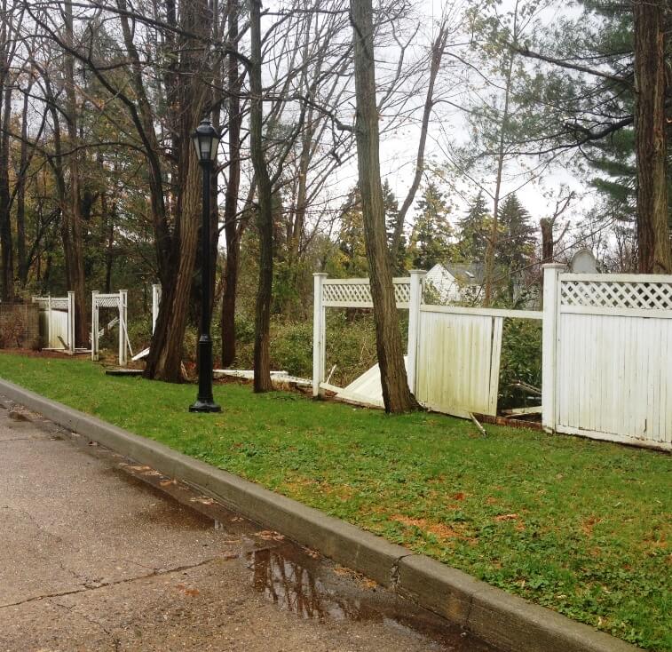 Photo of damaged fencing at Training Center following Hurricane Sandy