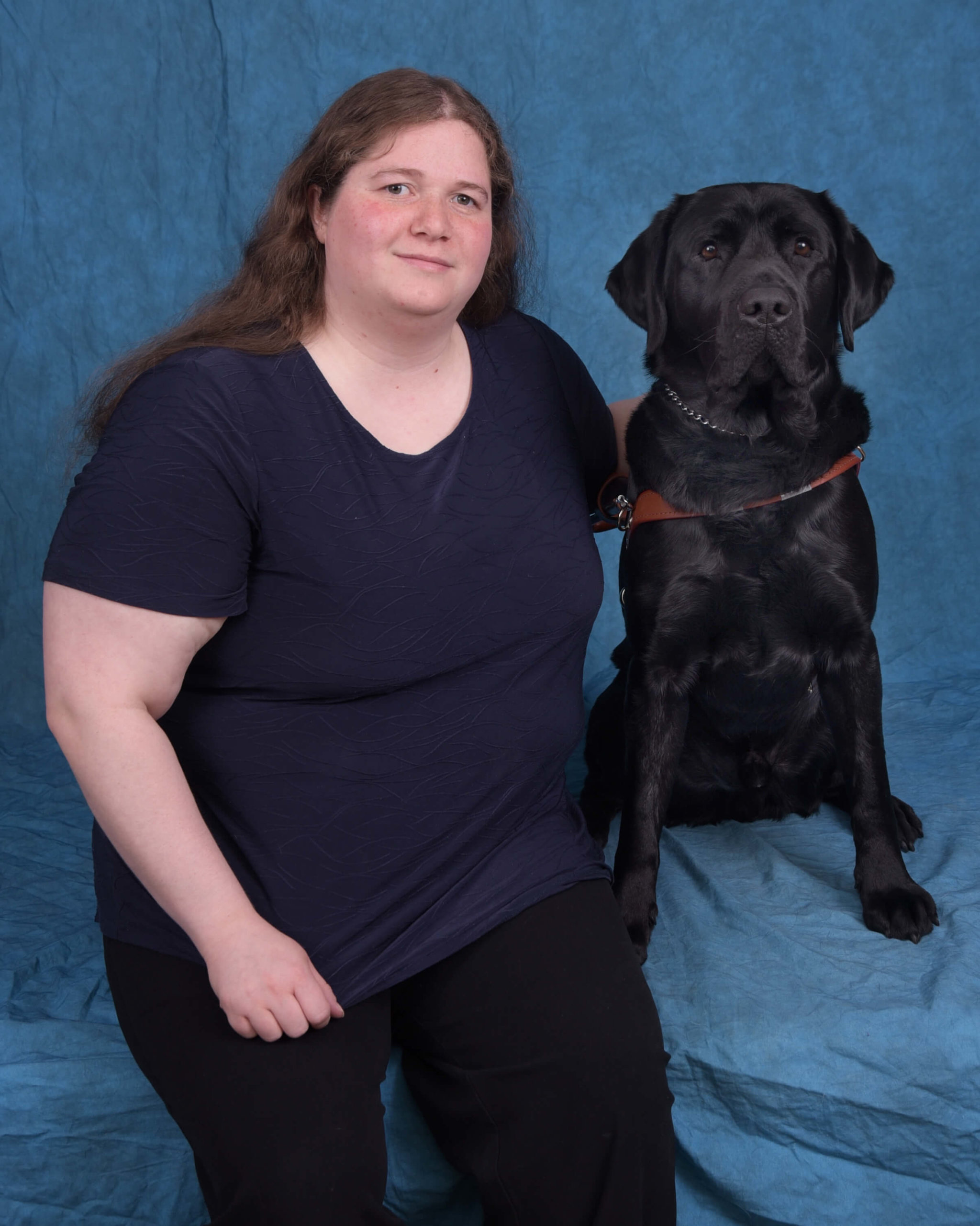 Graduate Rochelle and guide dog Yeats