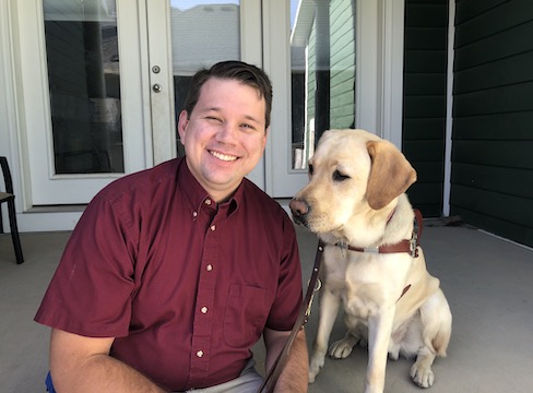 Graduate Ryan and guide dog Levi