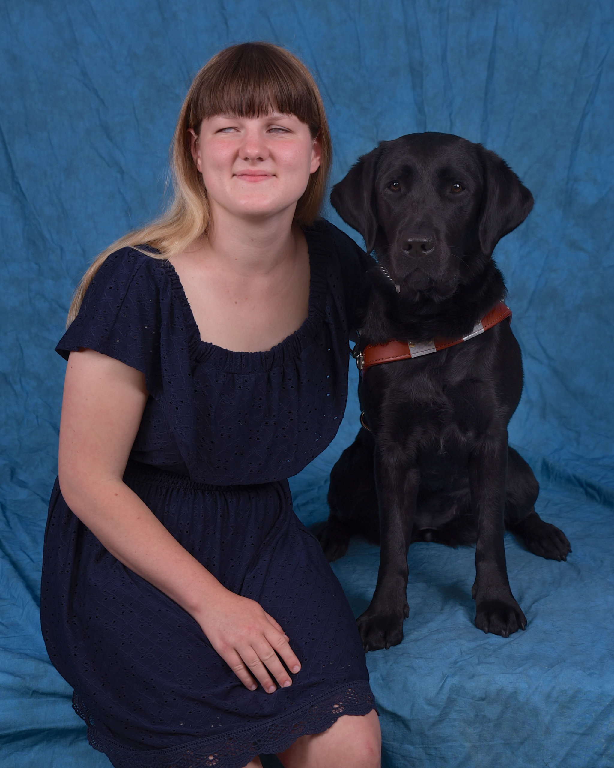 Graduation photo of July graduate Shyanne and guide dog Olive