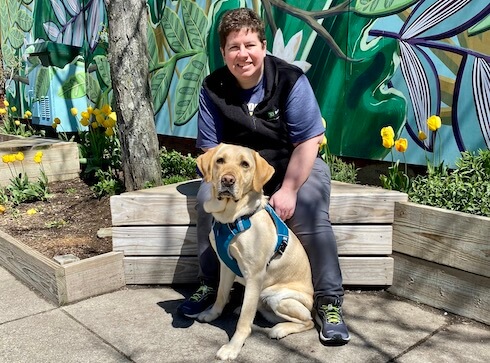 Graduate Sadie and guide dog Legend