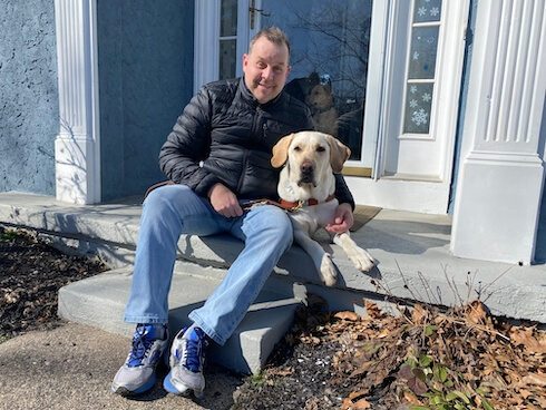 Sam and his guide dog Stan