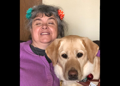 Grad Sue Ellen and guide Twig