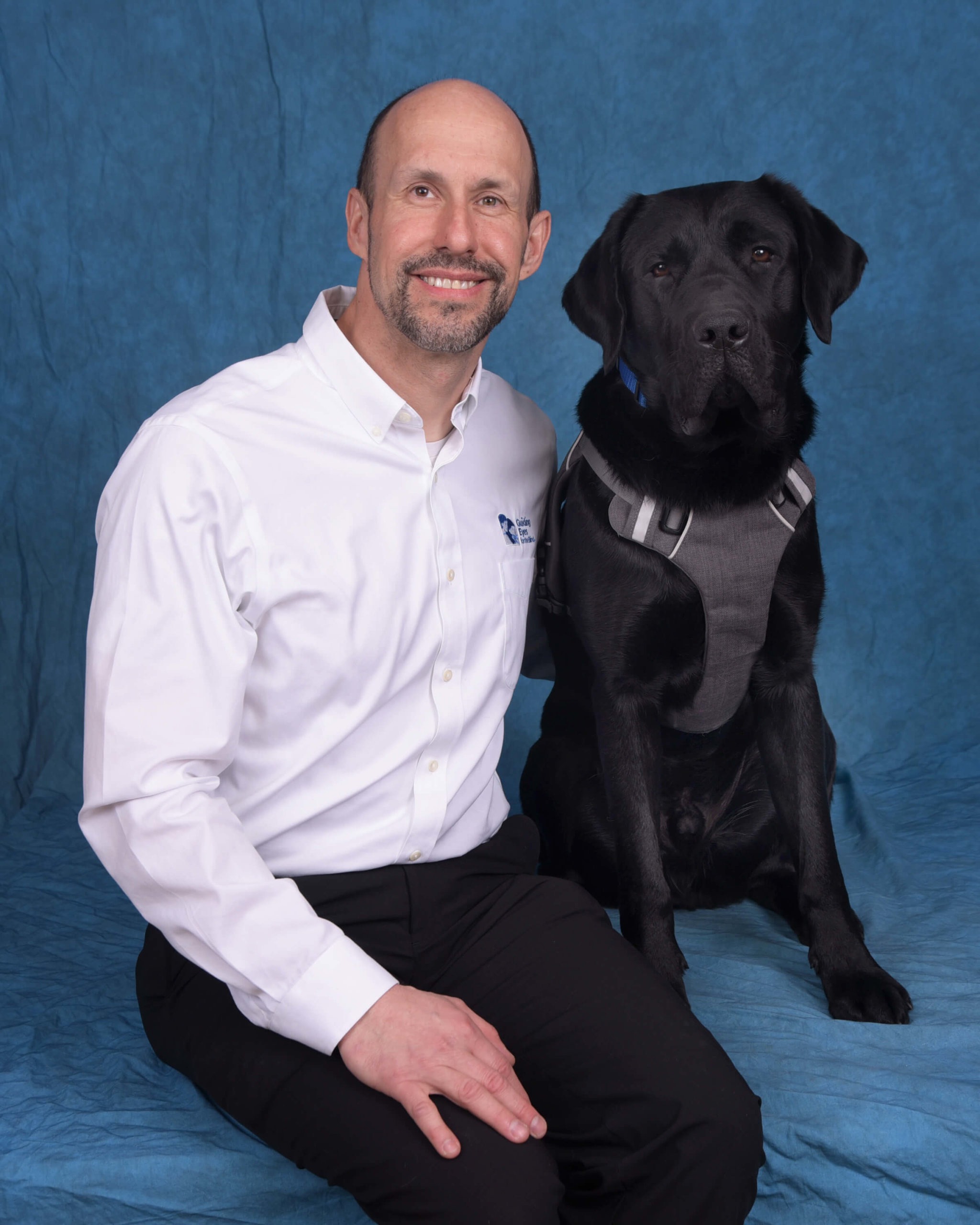 Graduate Thomas and guide dog Westley