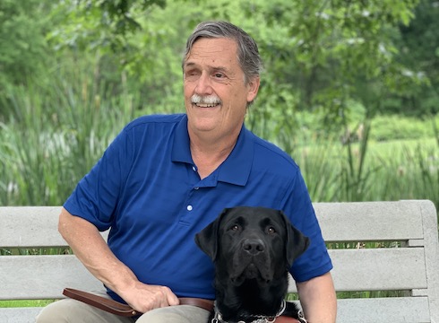 Graduate Terry and guide dog Namath