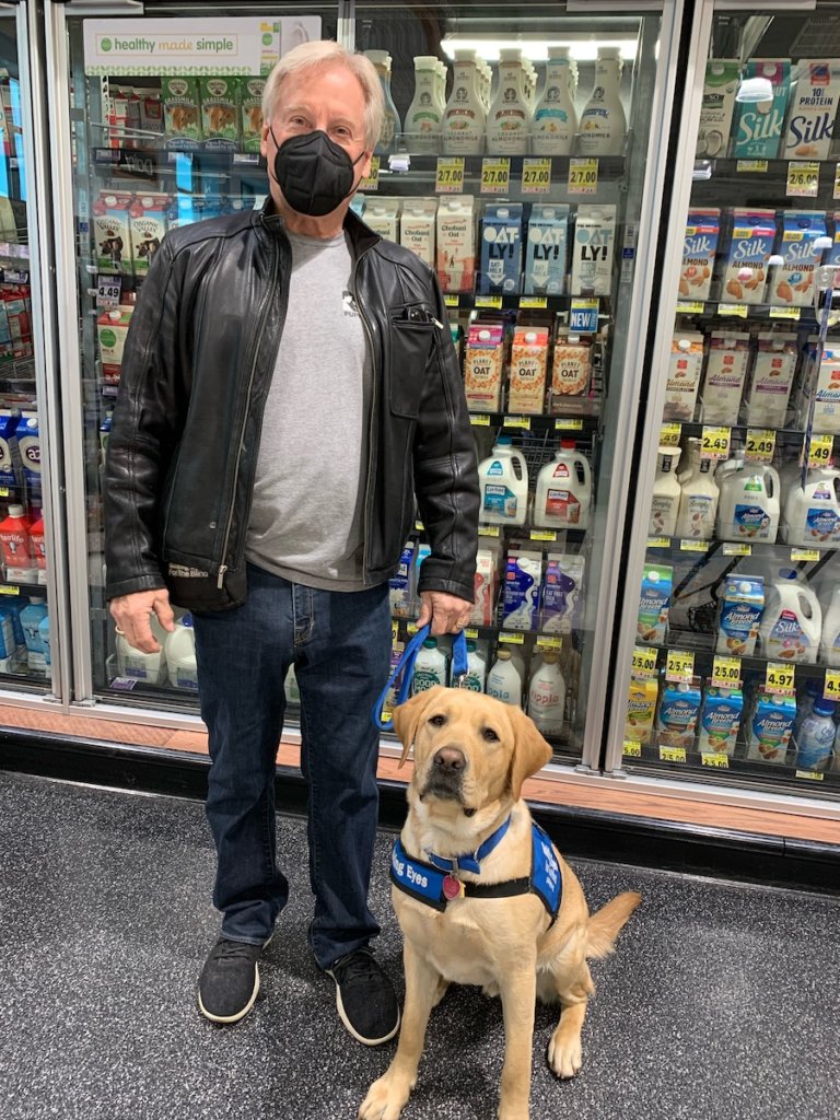 Merlin with raiser Terry at the grocery store