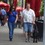 June graduate Tony & guide dog Walter during a training session on a city sidewalk