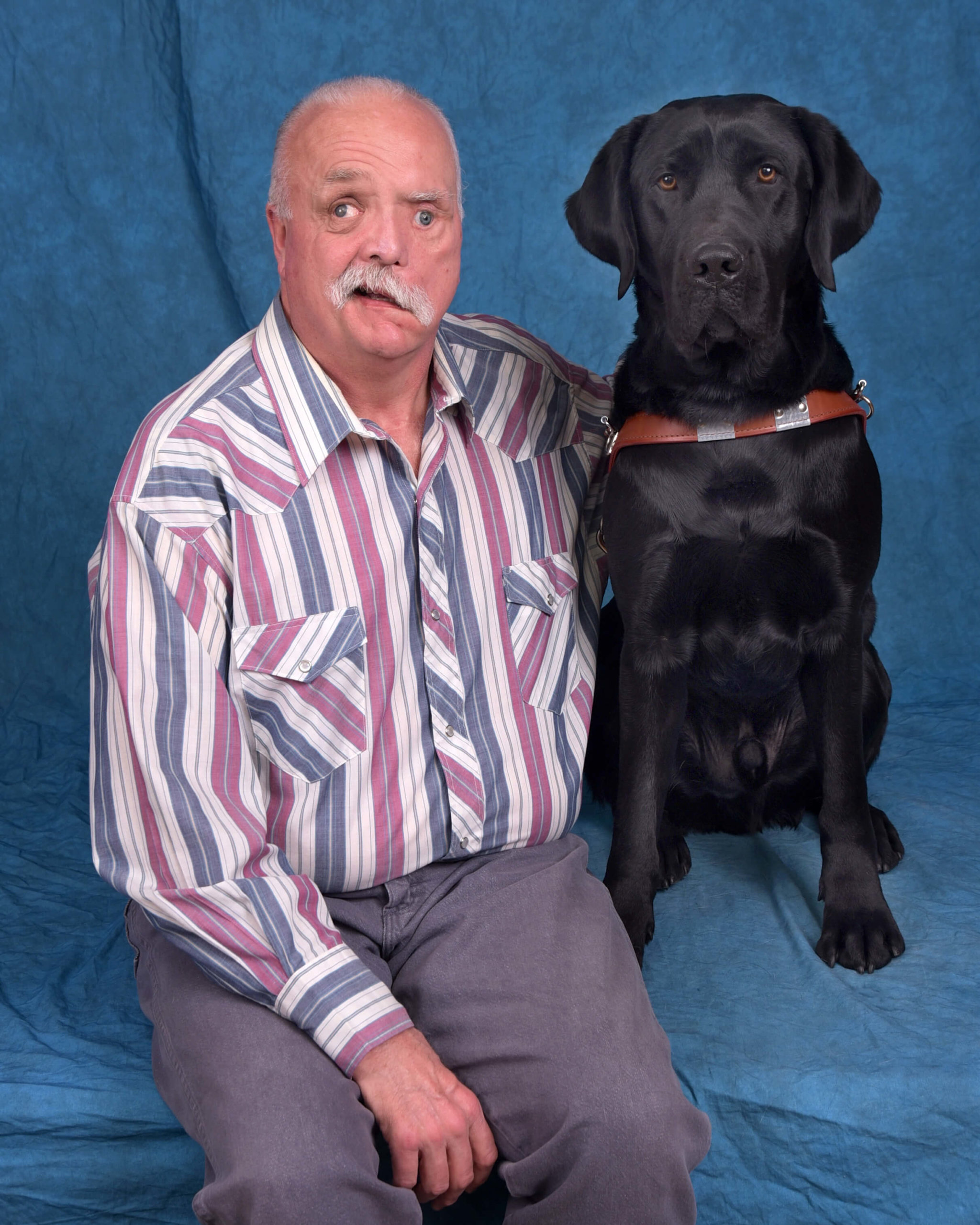 Graduate Walter and guide dog Midas