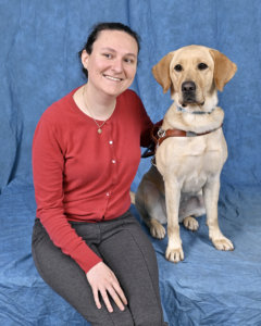 Graduate Daniela and yellow Lab guide dog Leilani