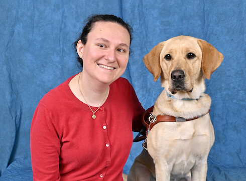 Graduate Daniela and yellow Lab guide dog Leilani