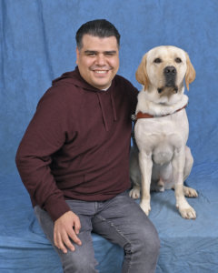 Graduate Jose and yellow Lab guide dog Ulysses
