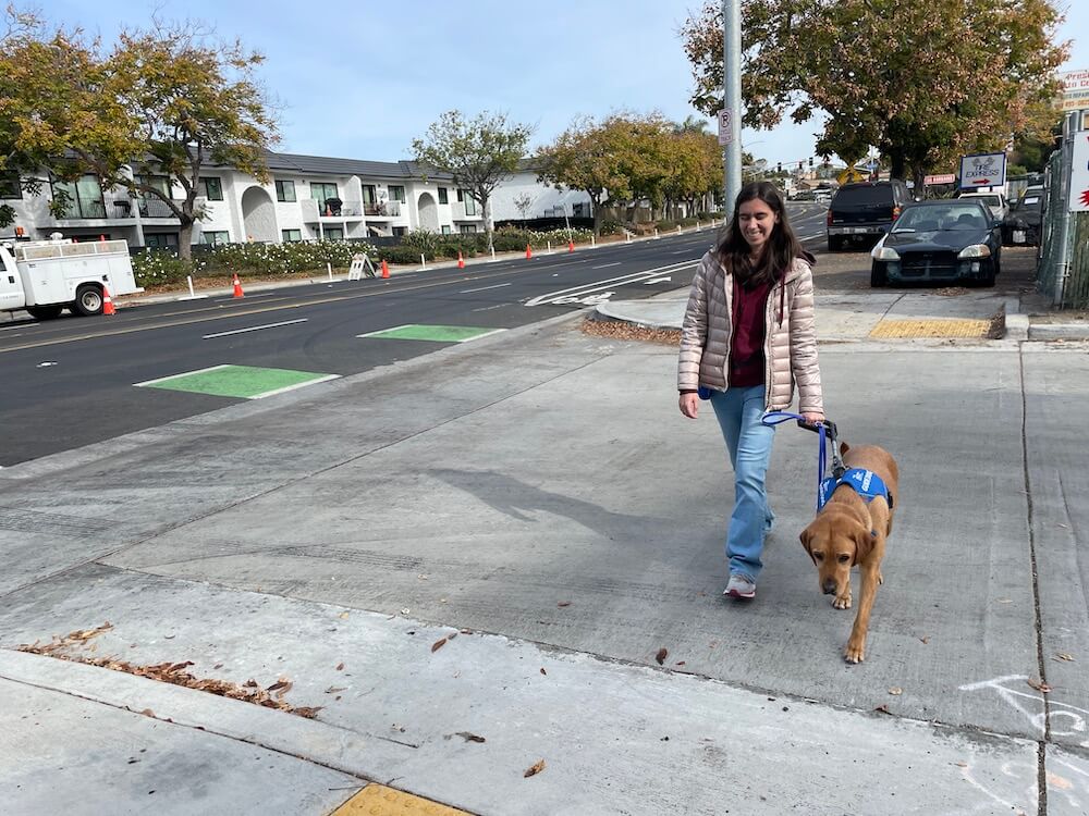 Miriam and Yani safely and confidently cross the street